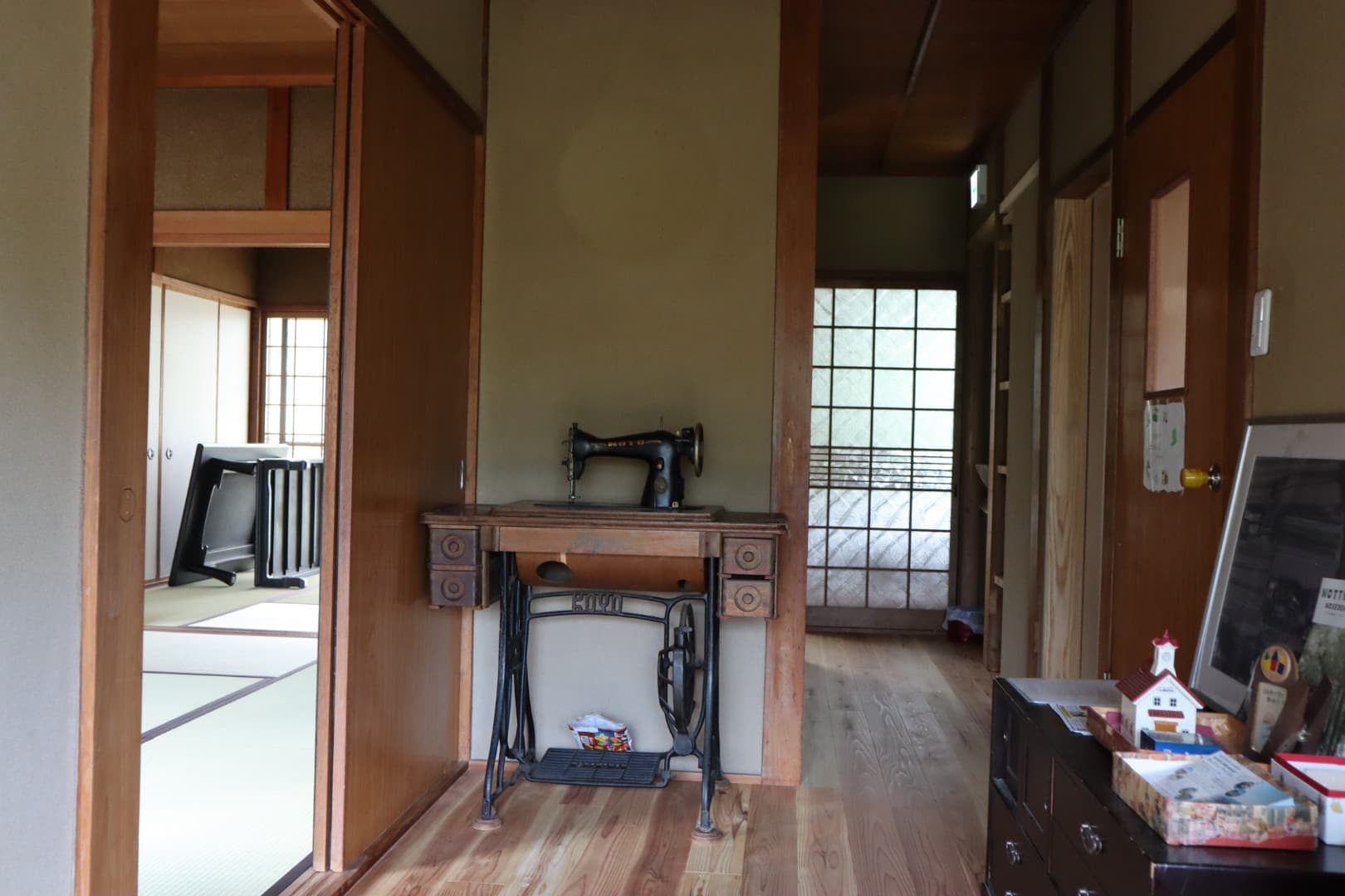 Interior of the Sasabase farmhouse — tatami and corridor